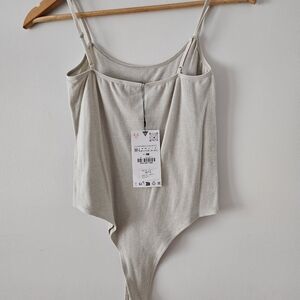 Beige Ribbed Bodysuit